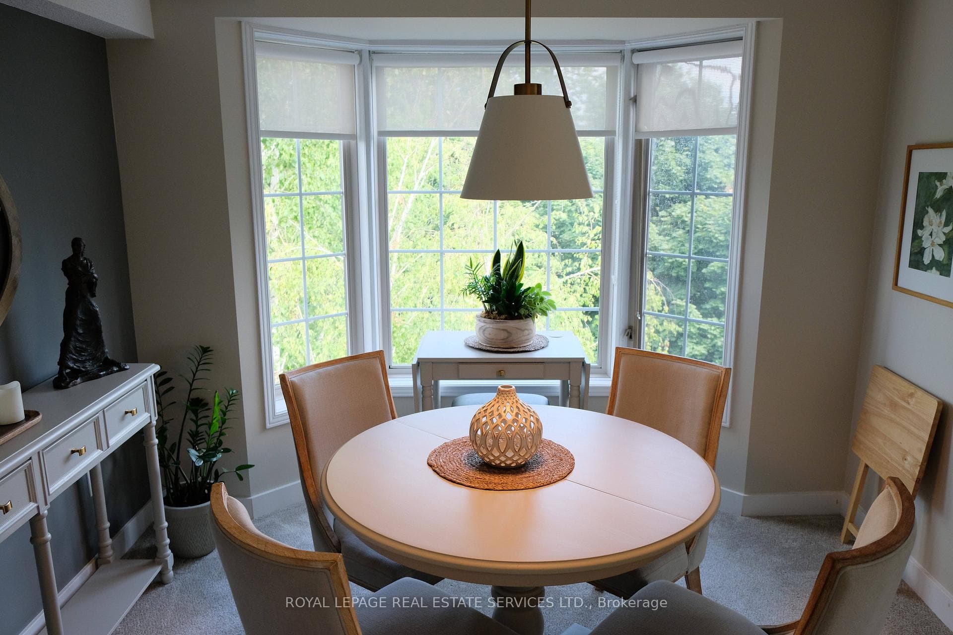 updated contemporary dining area with bay window