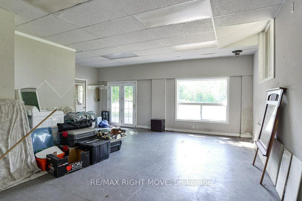 This would be a great home gym; tall ceilings.