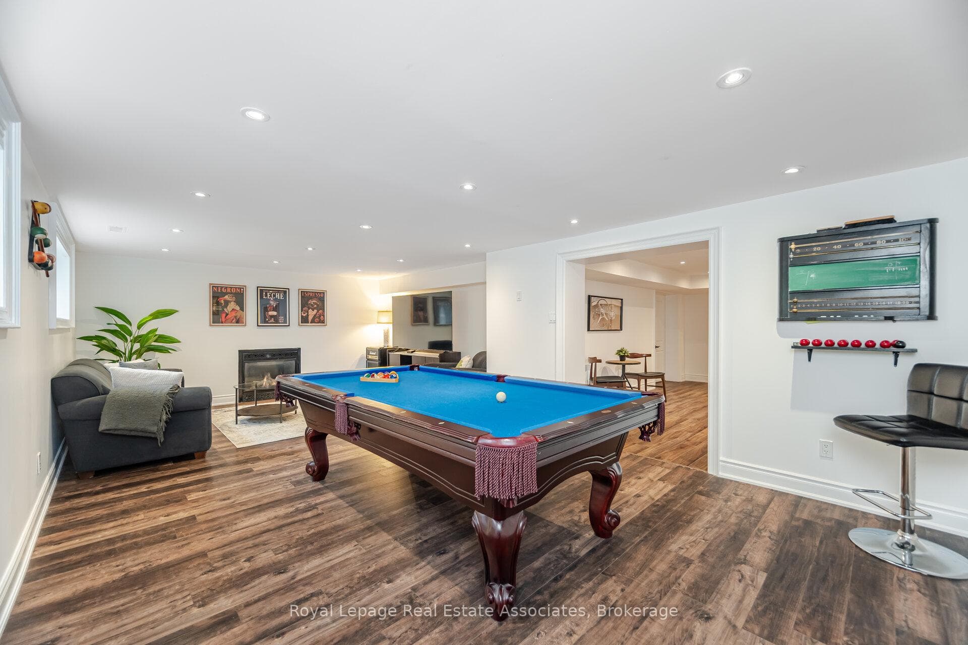 Rec room with gas fireplace & large windows