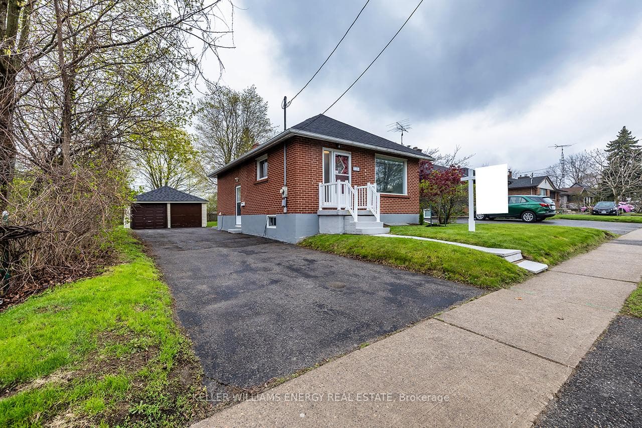 O/size d/way/ 2 car garage & side entrance to home
