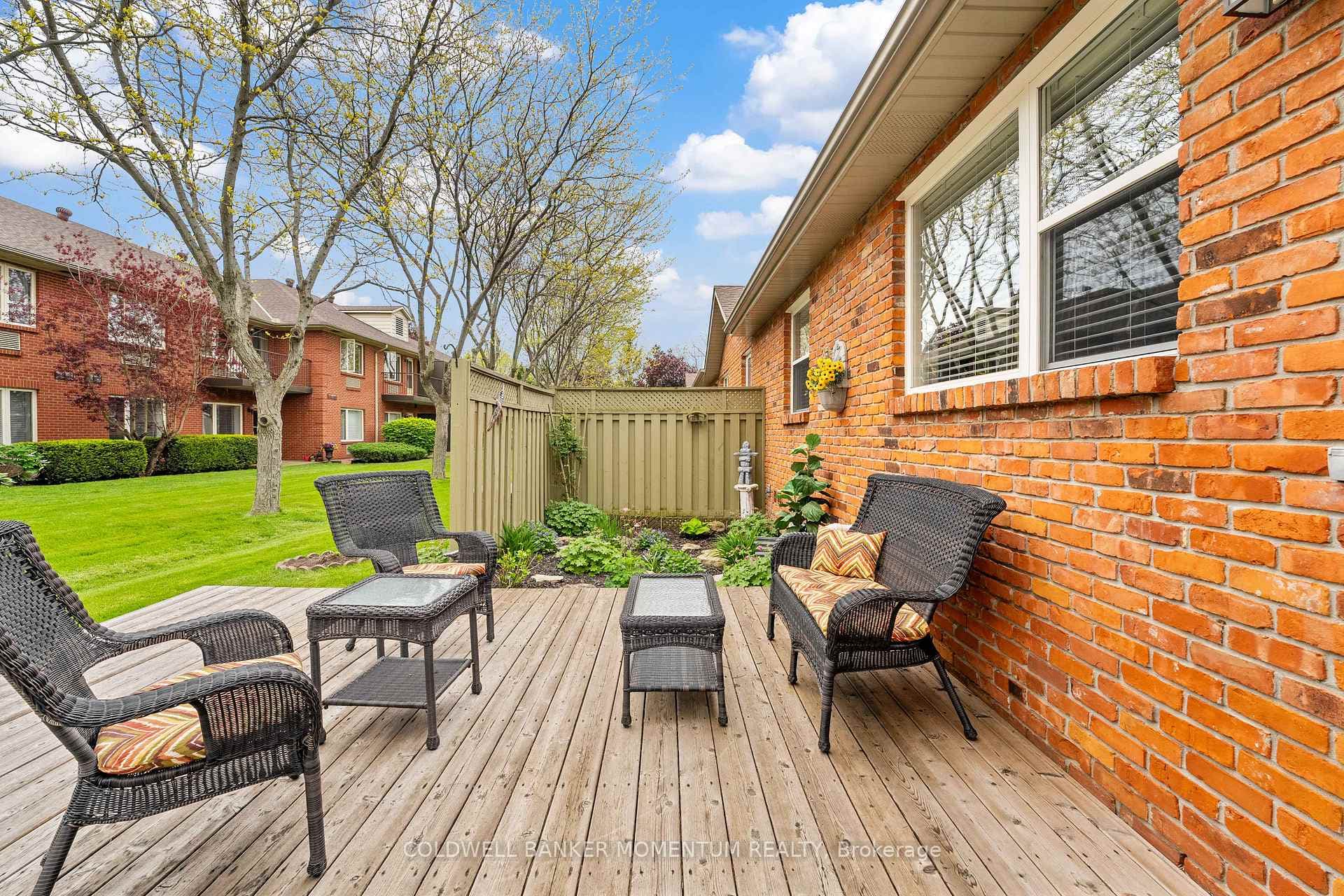 Cedar deck sitting area with privacy partitions