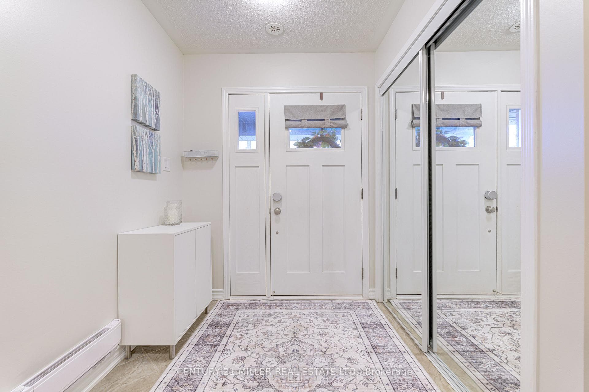 Foyer featuring large closet