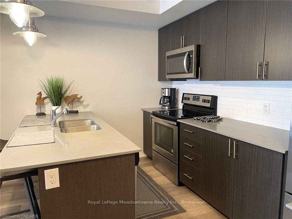 1208 MAIN STREET EAST N/A Unit 102 photo 4