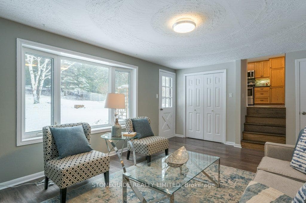 Family Room Walks Up to Kitchen