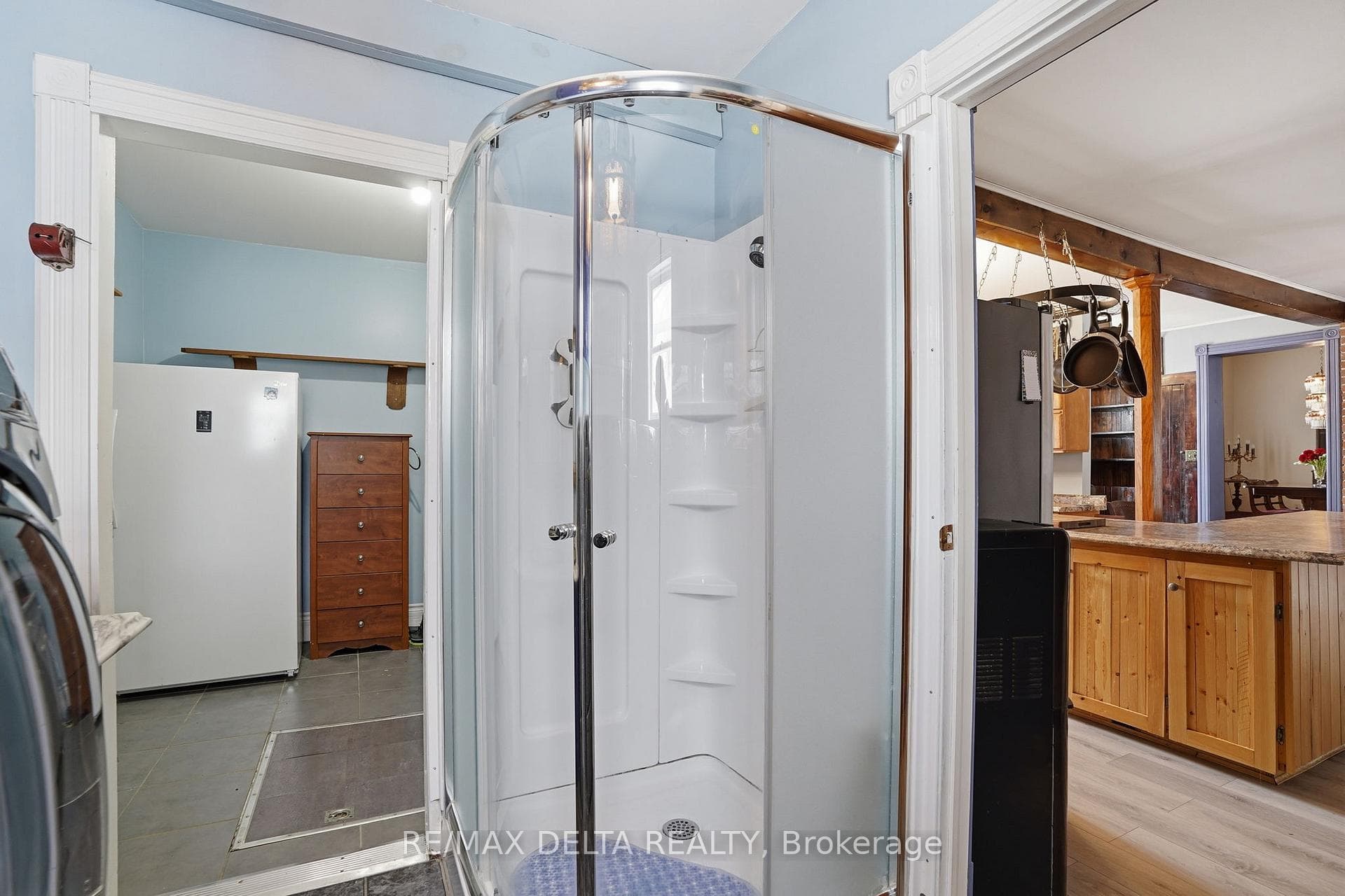 Shower in laundry room, off kitchen.