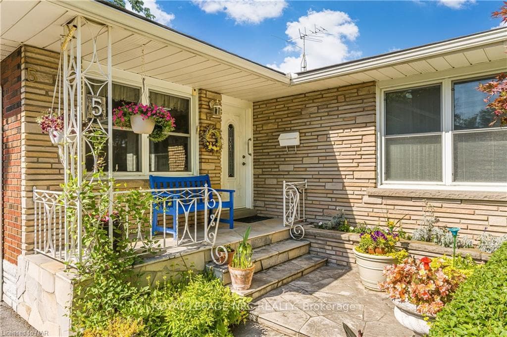 Sit and enjoy some privacy on the front veranda.