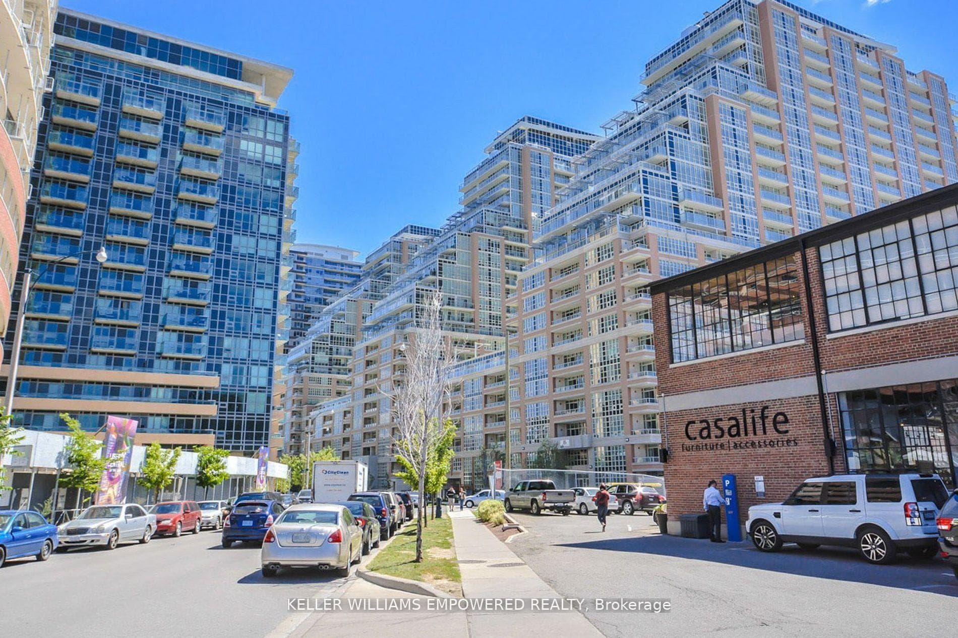 Condo nestled amid modern urban structures