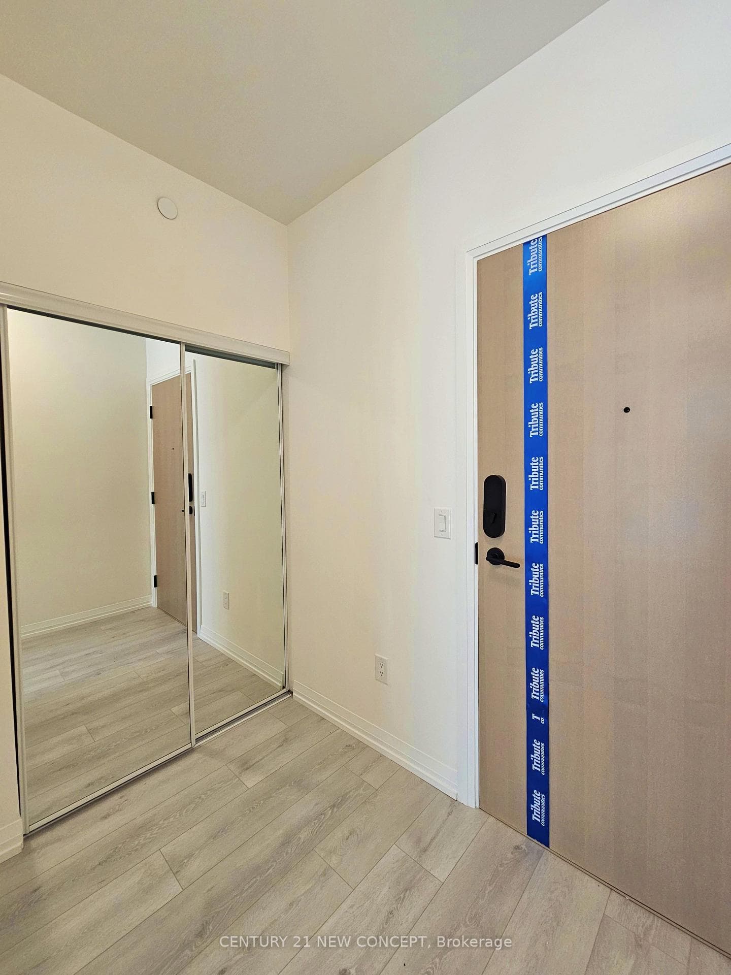 Bright Entry Hallway With Full-Height Closet
