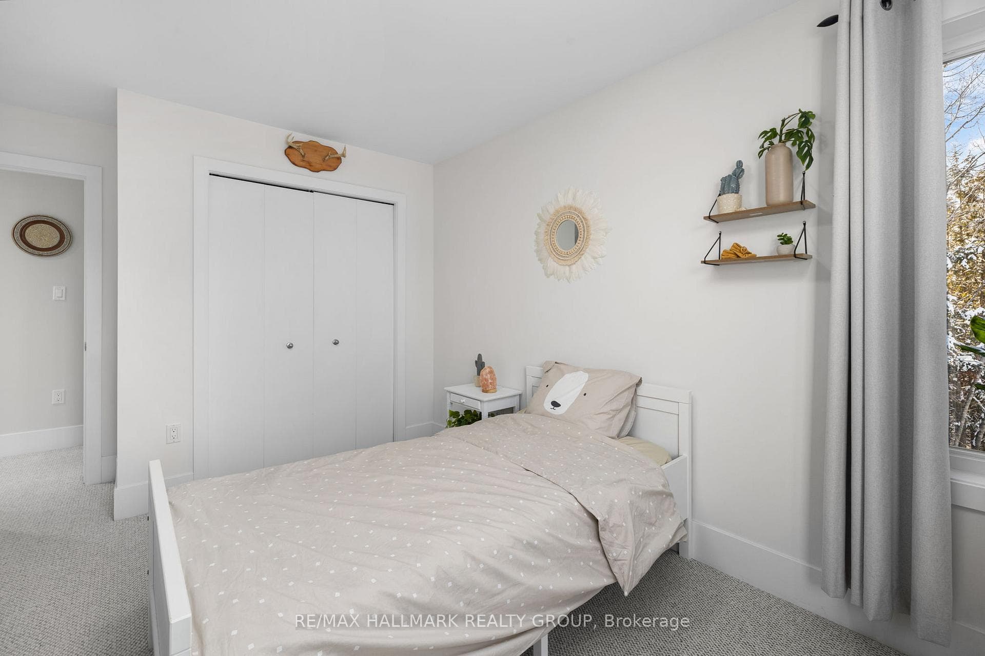 Cozy second bedroom with built-in closet