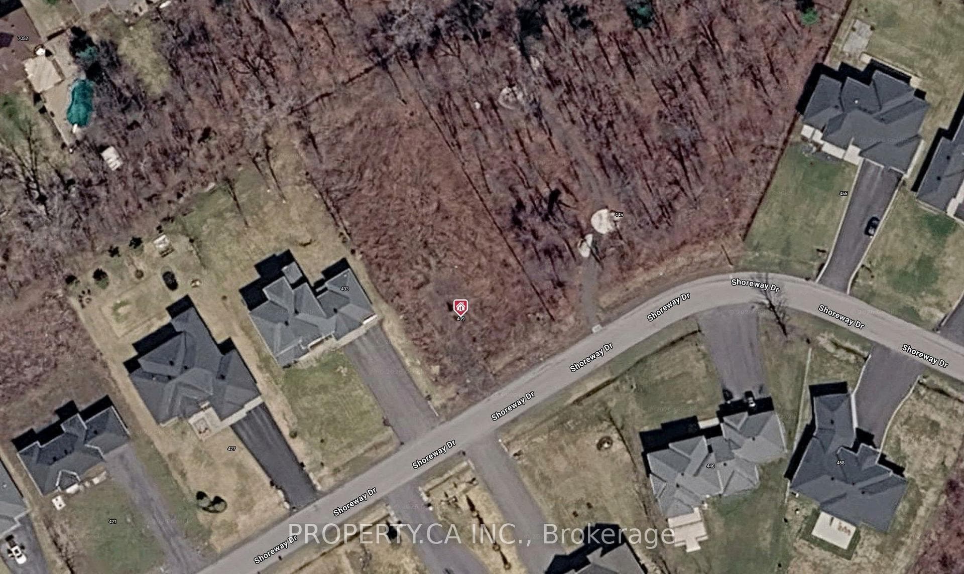 Undeveloped lot to right is a future City Park