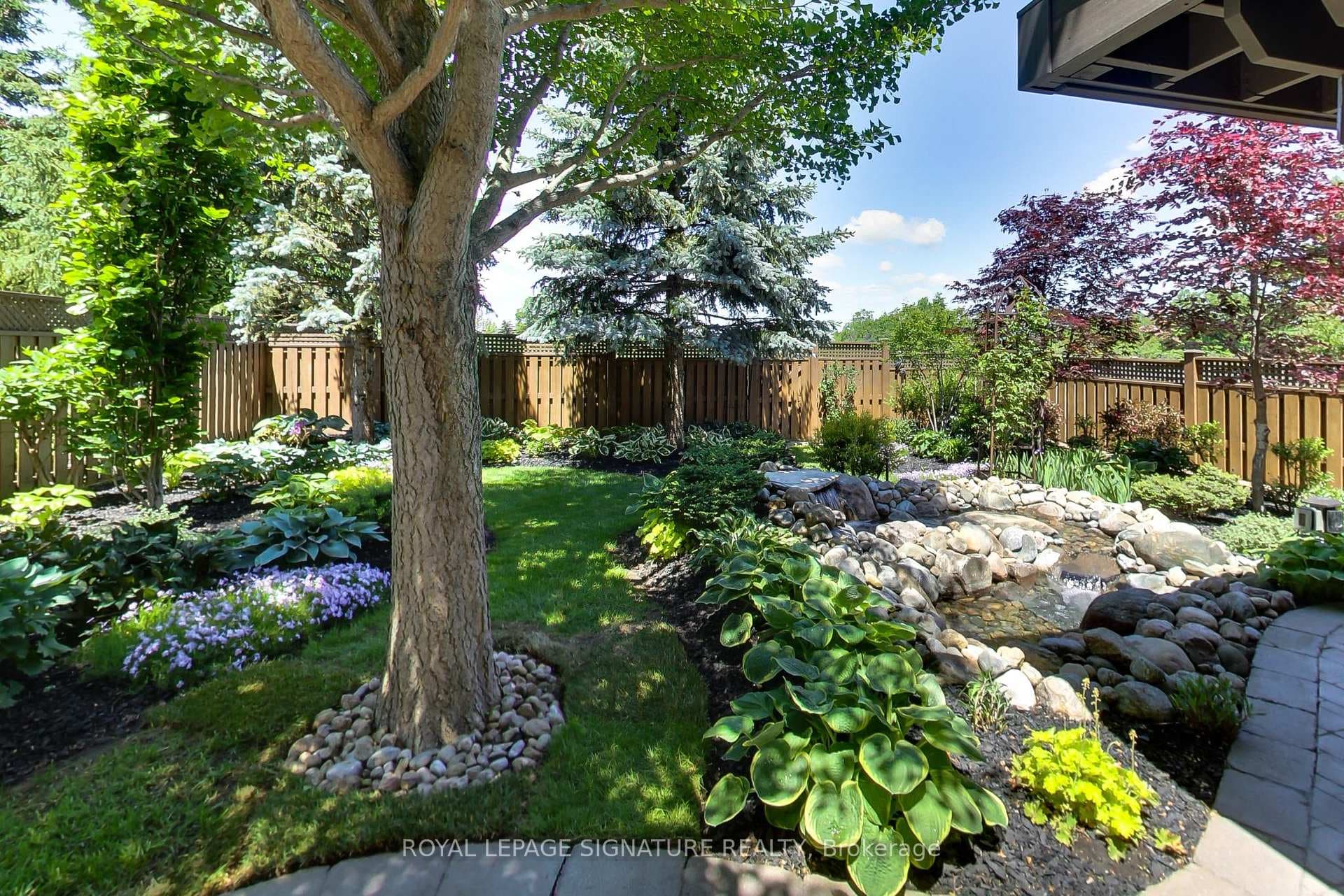 Mature trees, manicured gardens