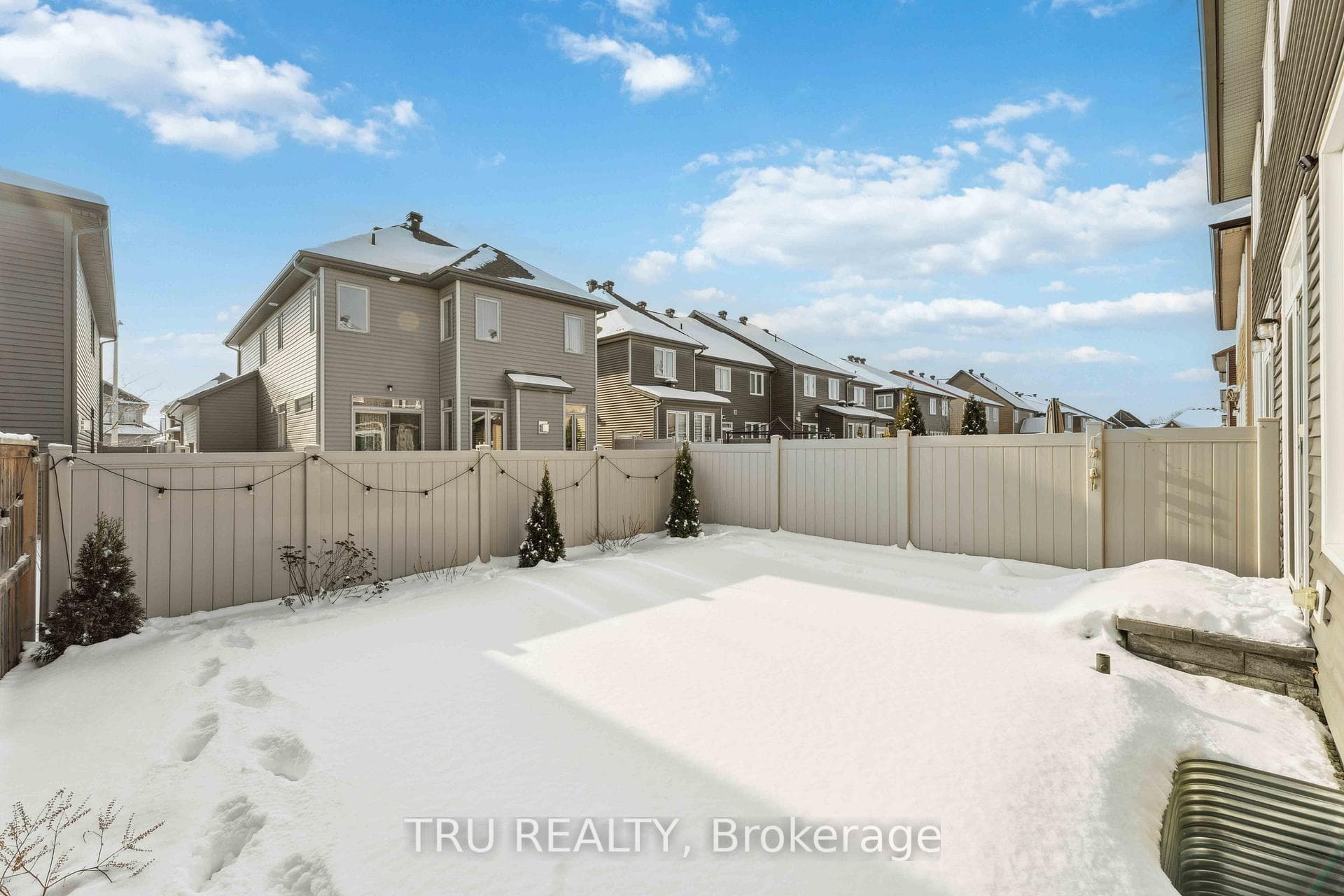 Fenced Landscaped Backyard