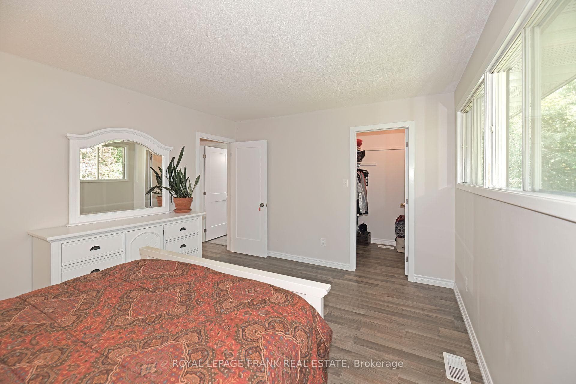 Master bedroom with walk-in closet
