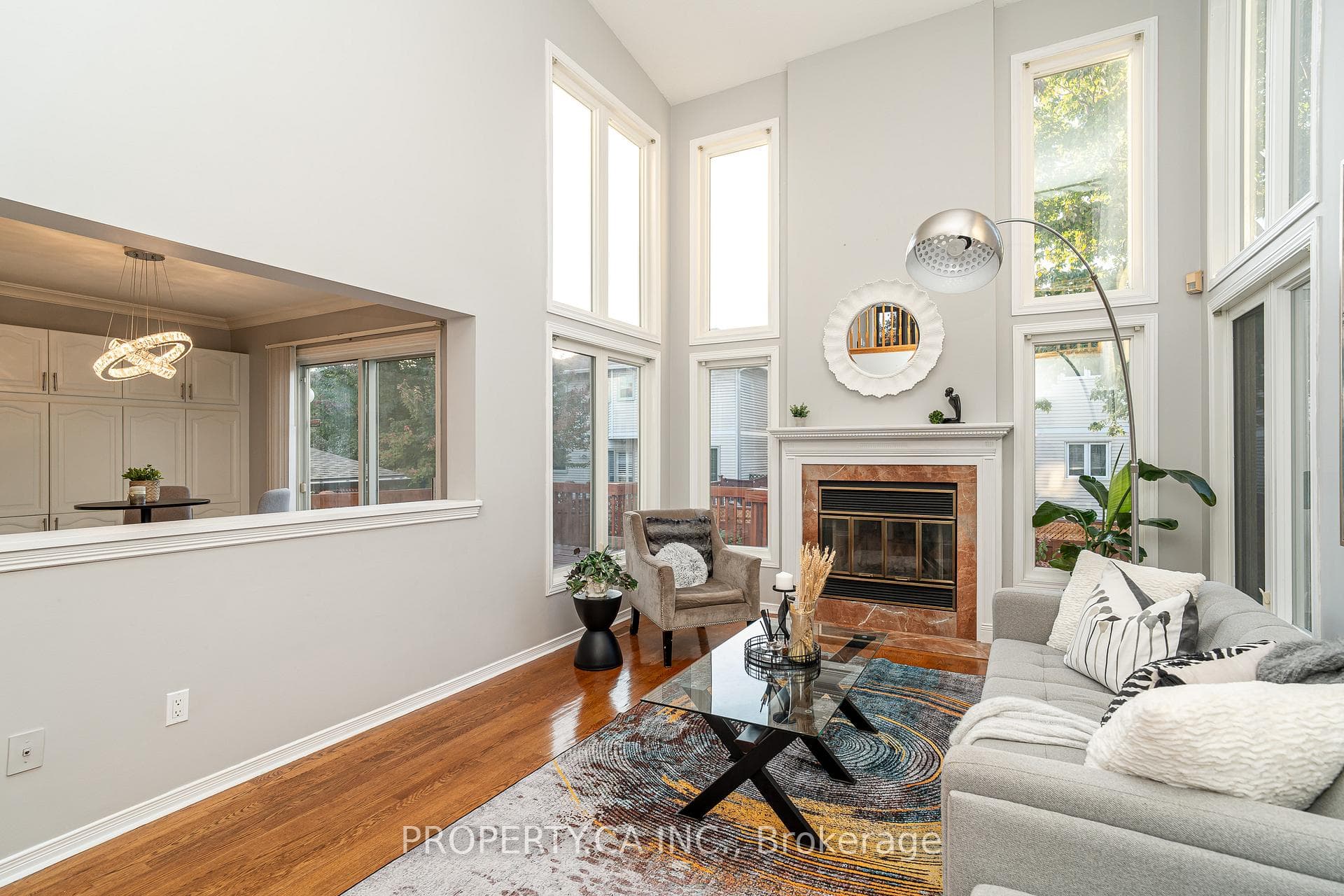 Family room open to above, wood-burning fireplace