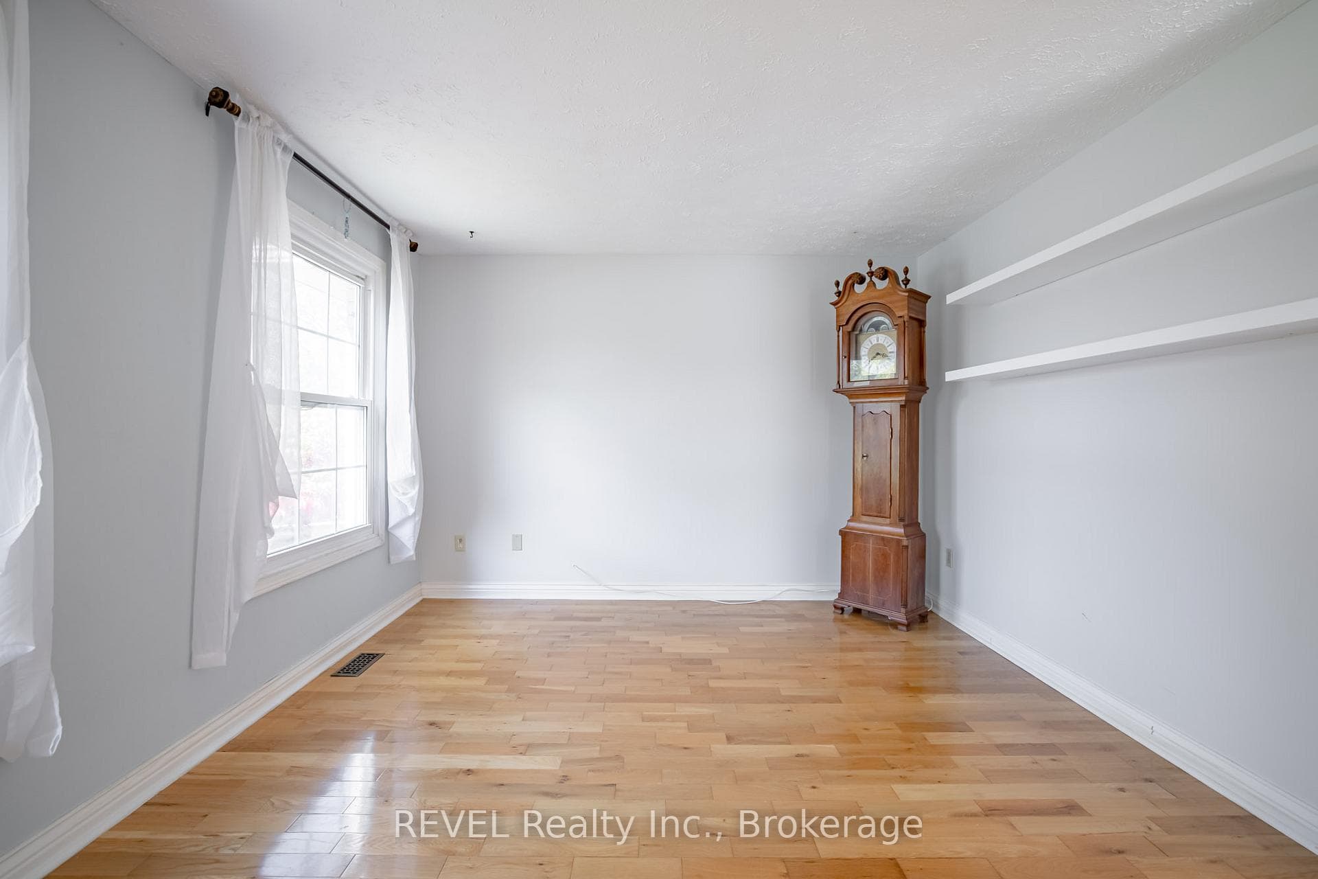 Living room with 2 large windows
