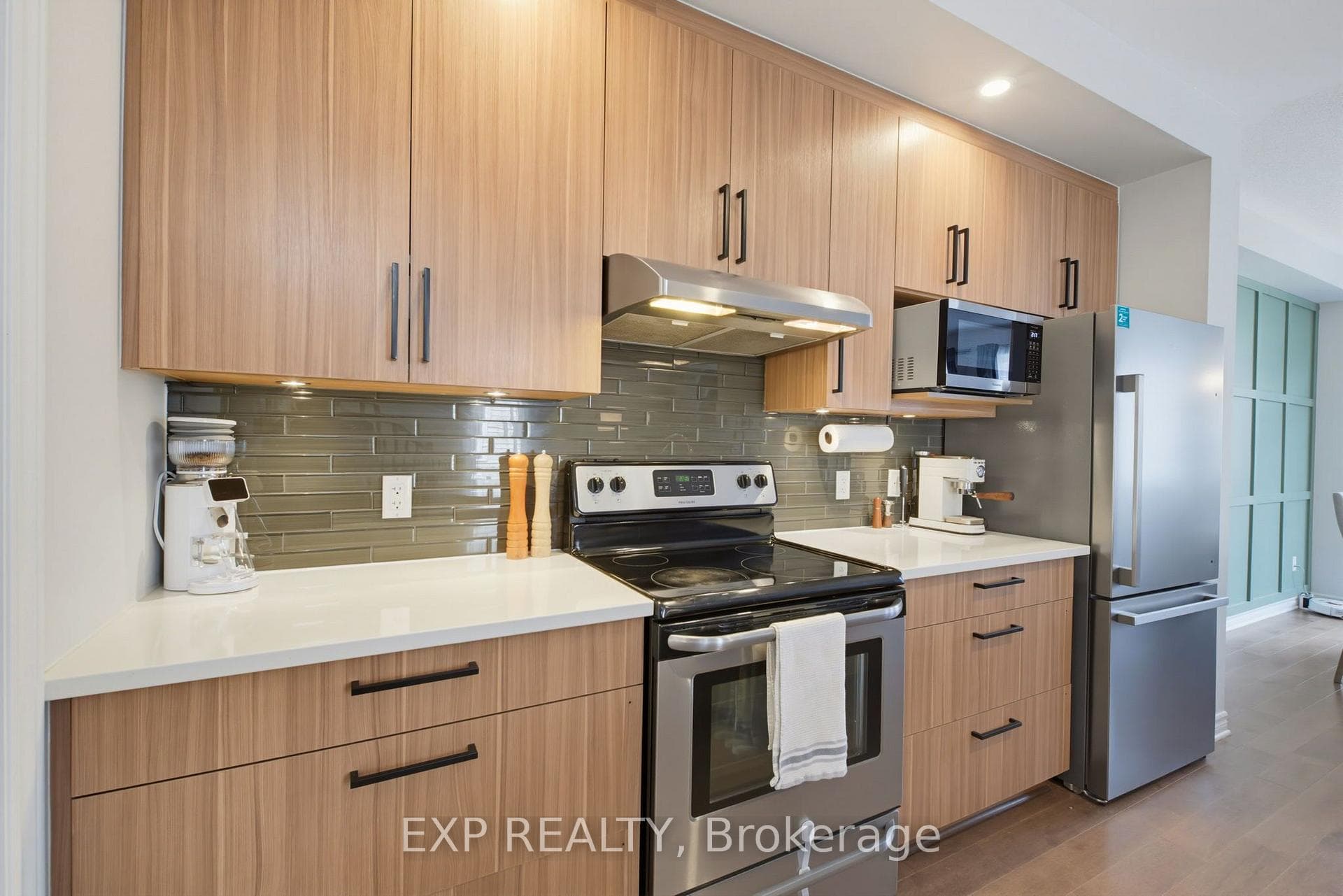 Upgraded Backsplash And Stainless Appliances.