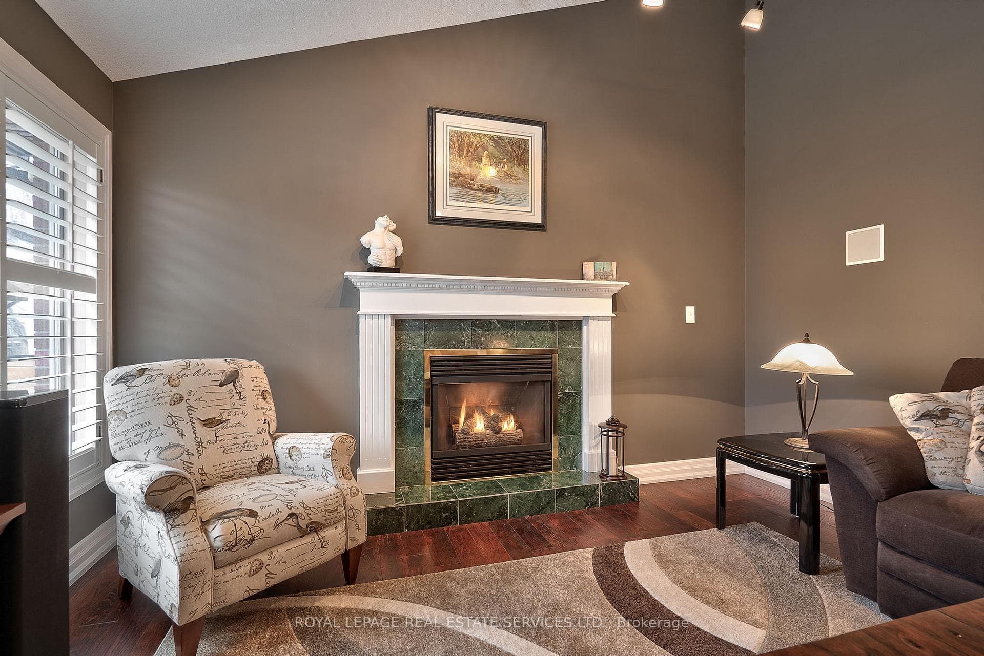 Family Room with a Vaulted Ceiling & Gas Fireplace