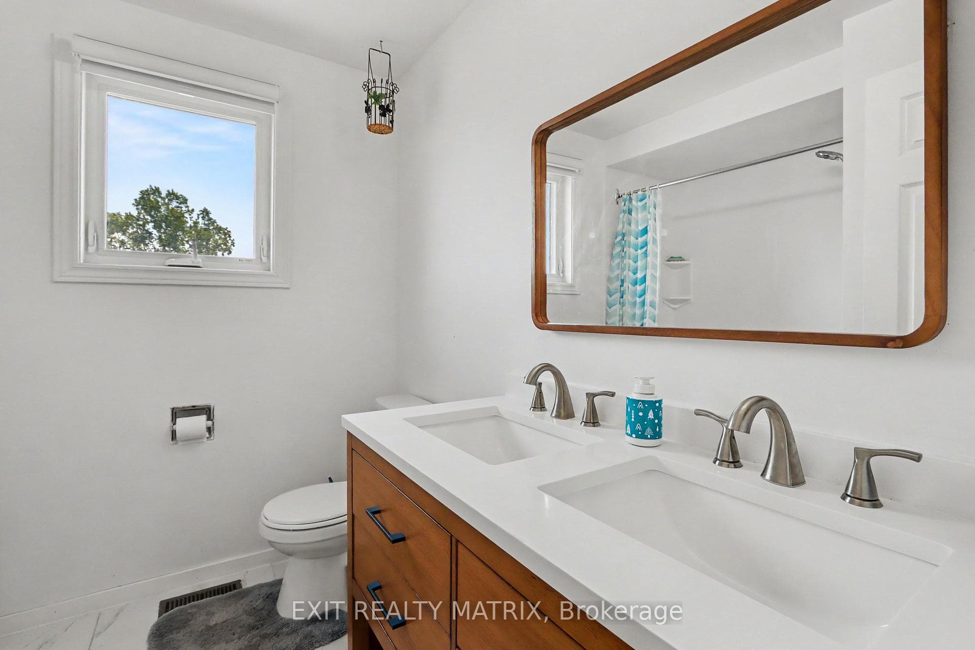 Washroom with convenient double sink