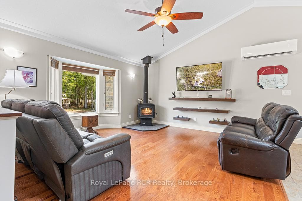 Open concept living with vaulted ceilings.