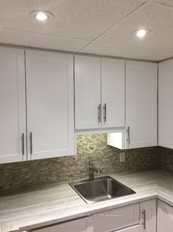 Unit A Kitchen. Before current Tenant.