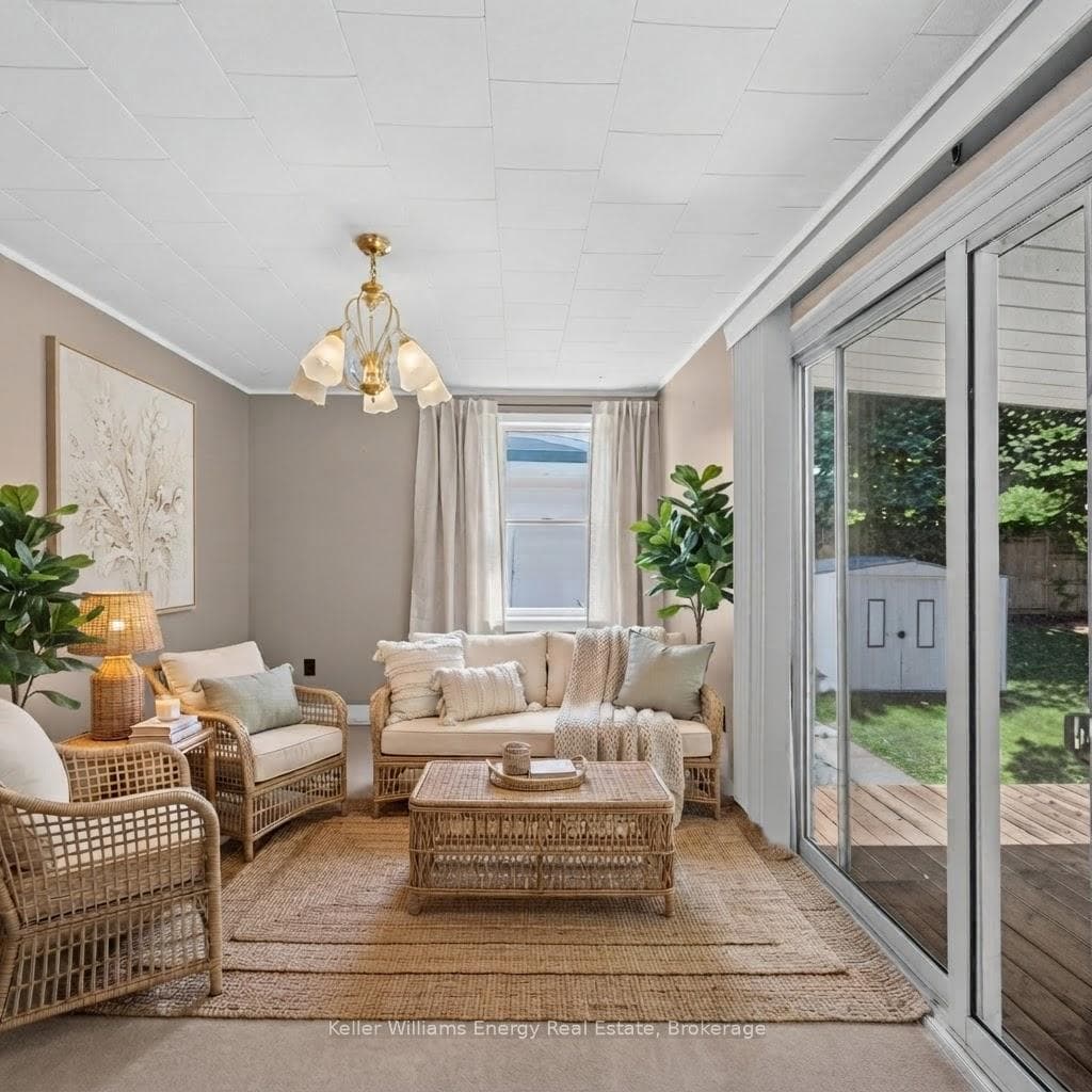 Staged Back Sunroom or Bedroom