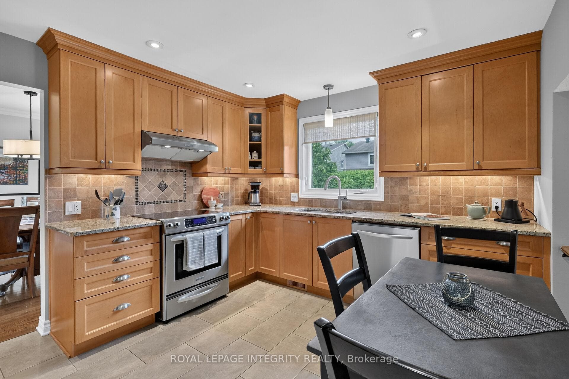 Enjoy the view of rear garden fr the large window.