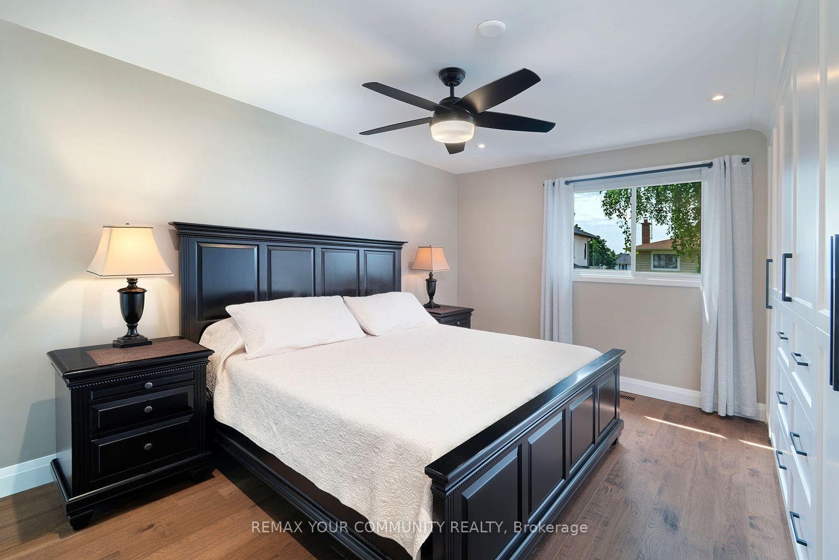 Spacious Primary Bedroom Overlooking Pool
