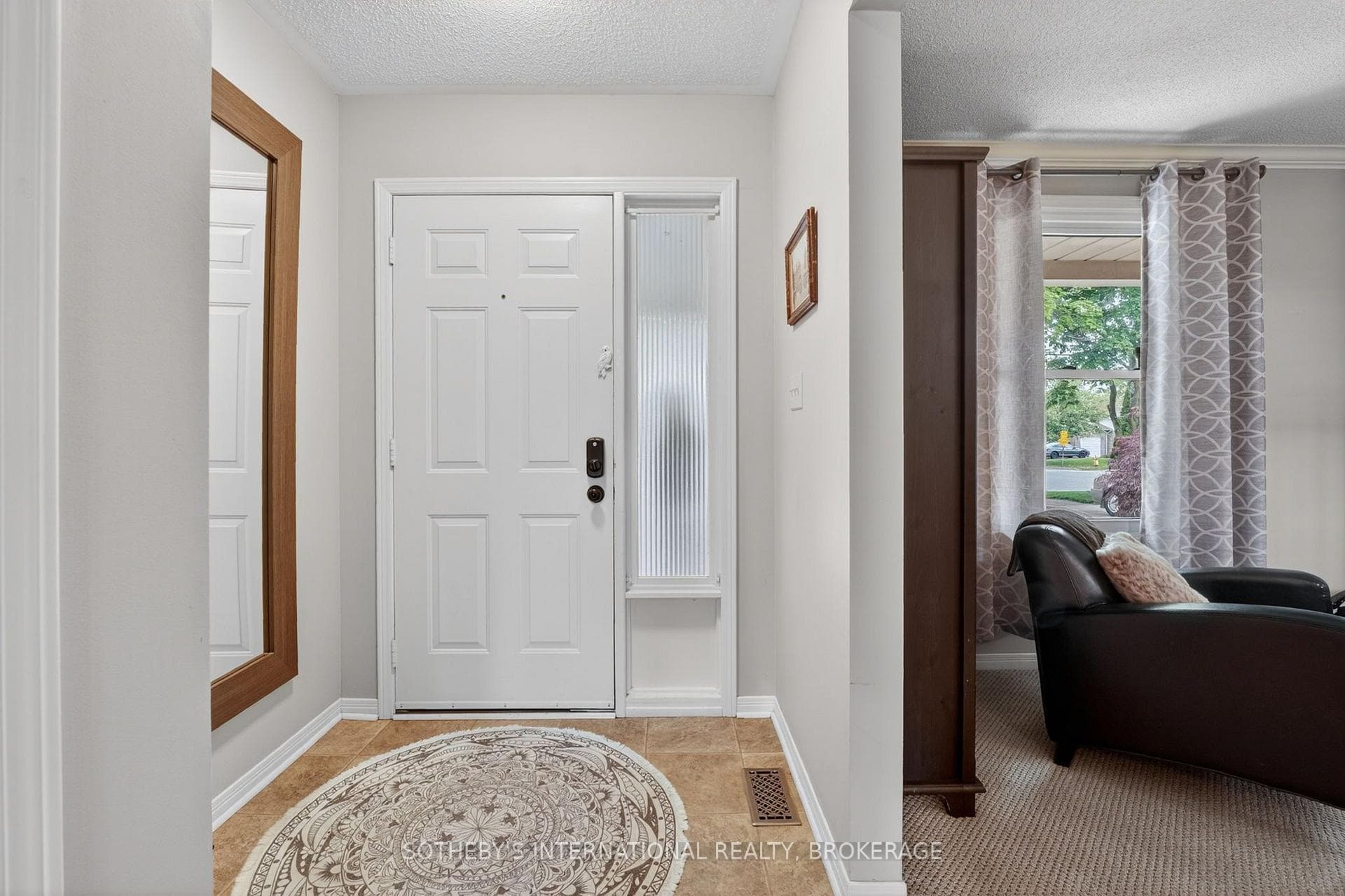 Welcoming foyer with closet