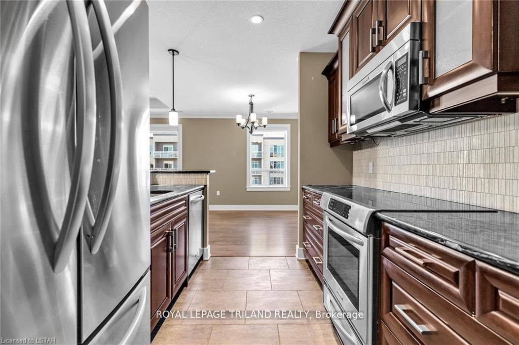 Granite Countertops with rich cabinetry