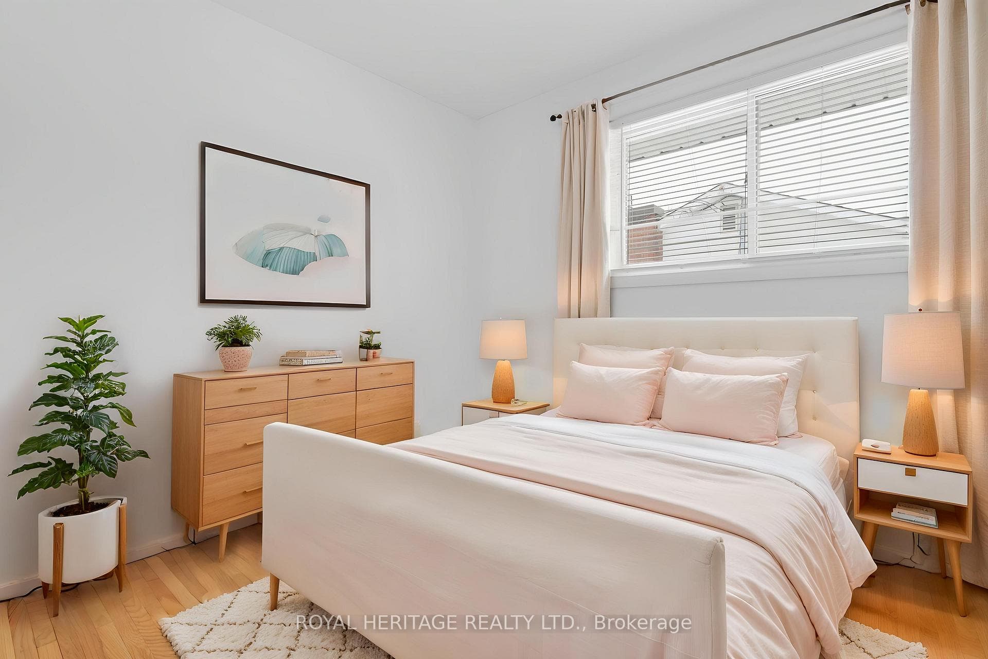 Spacious bright primary bedroom (virtually staged)