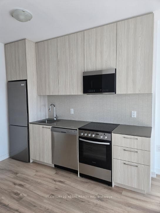 7439 Kingston Road Unit 307 photo 2