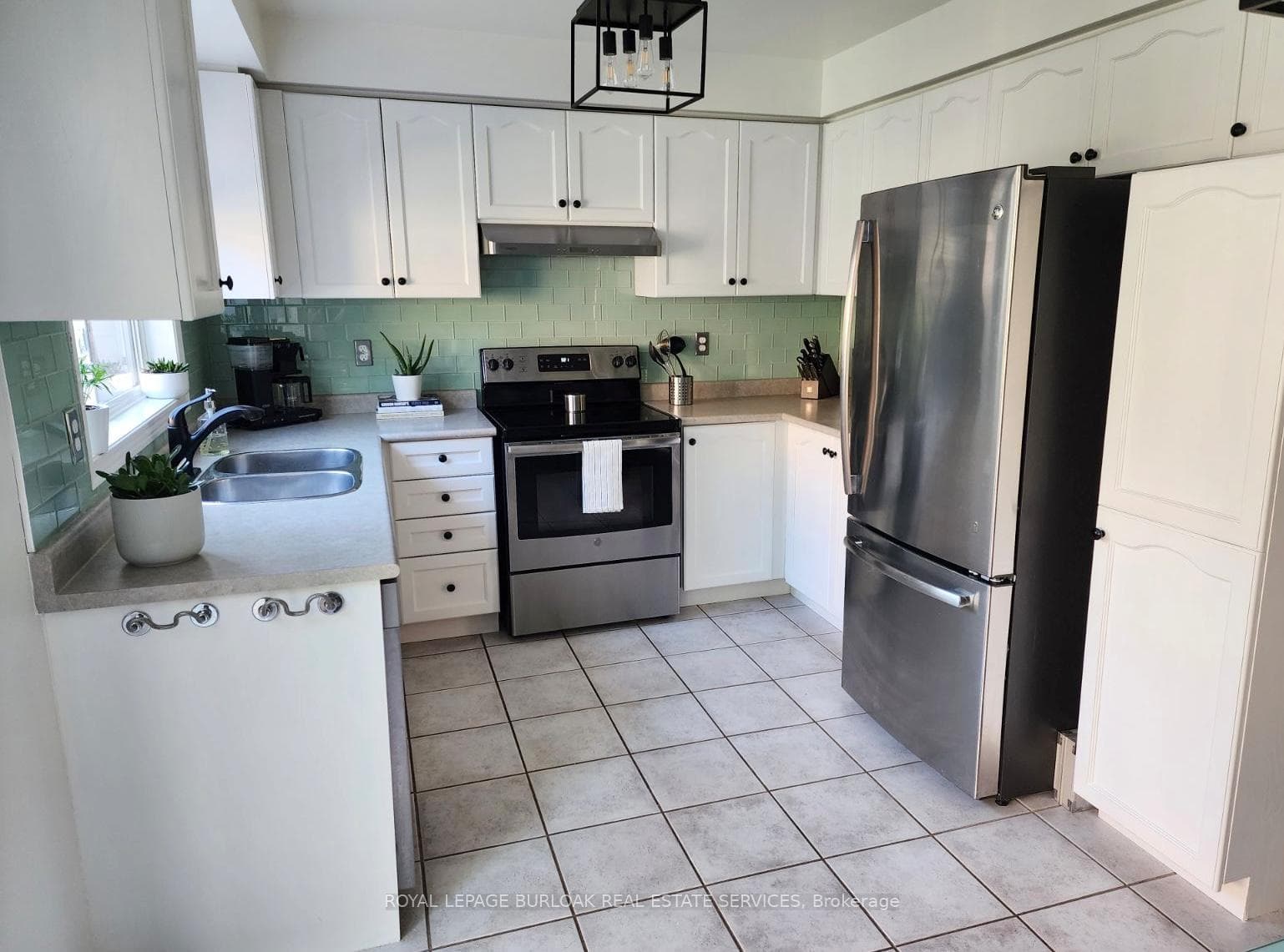 Plenty of cabinets, stainless appliances.