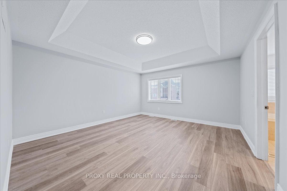 Huge Primary Bedroom With Cathedral Ceiling