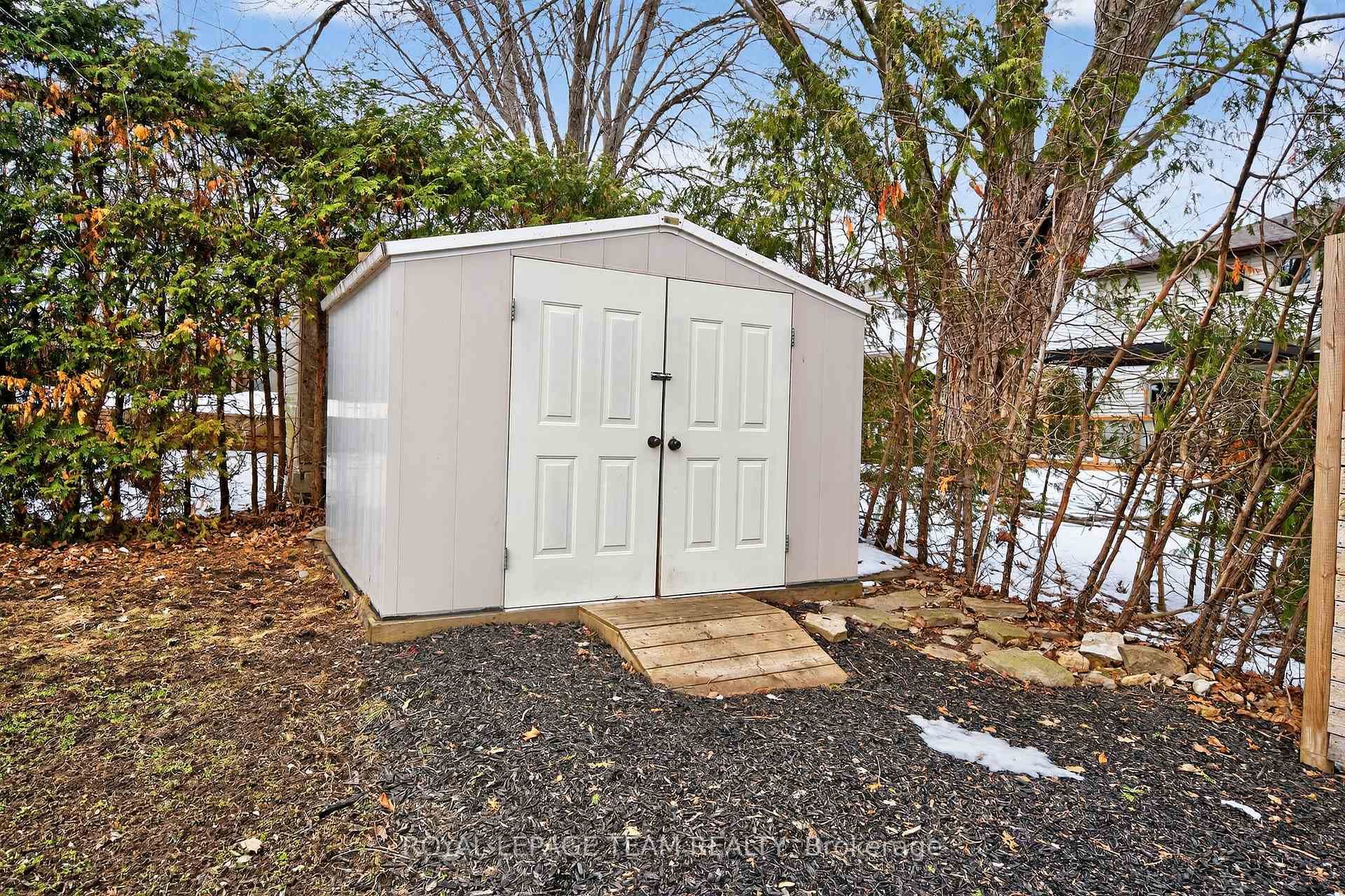 added tire mulch and new floor and pad for shed
