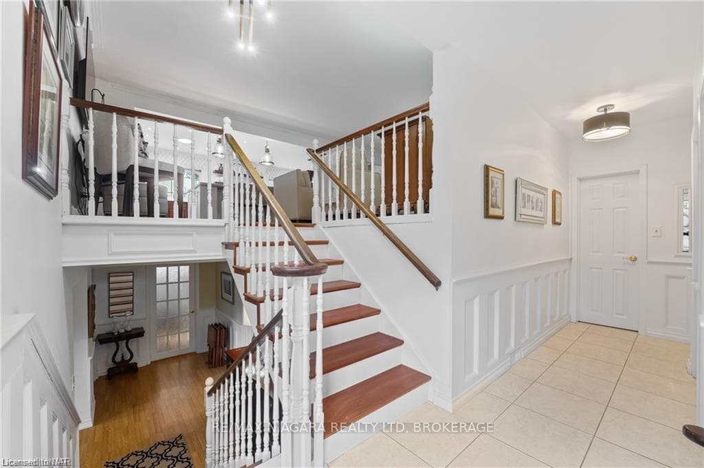 Stairway featuring tile patterned flooring
