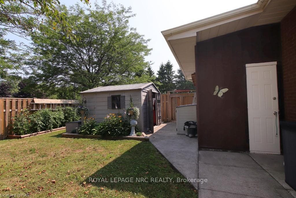 View of side and back entrance of garage