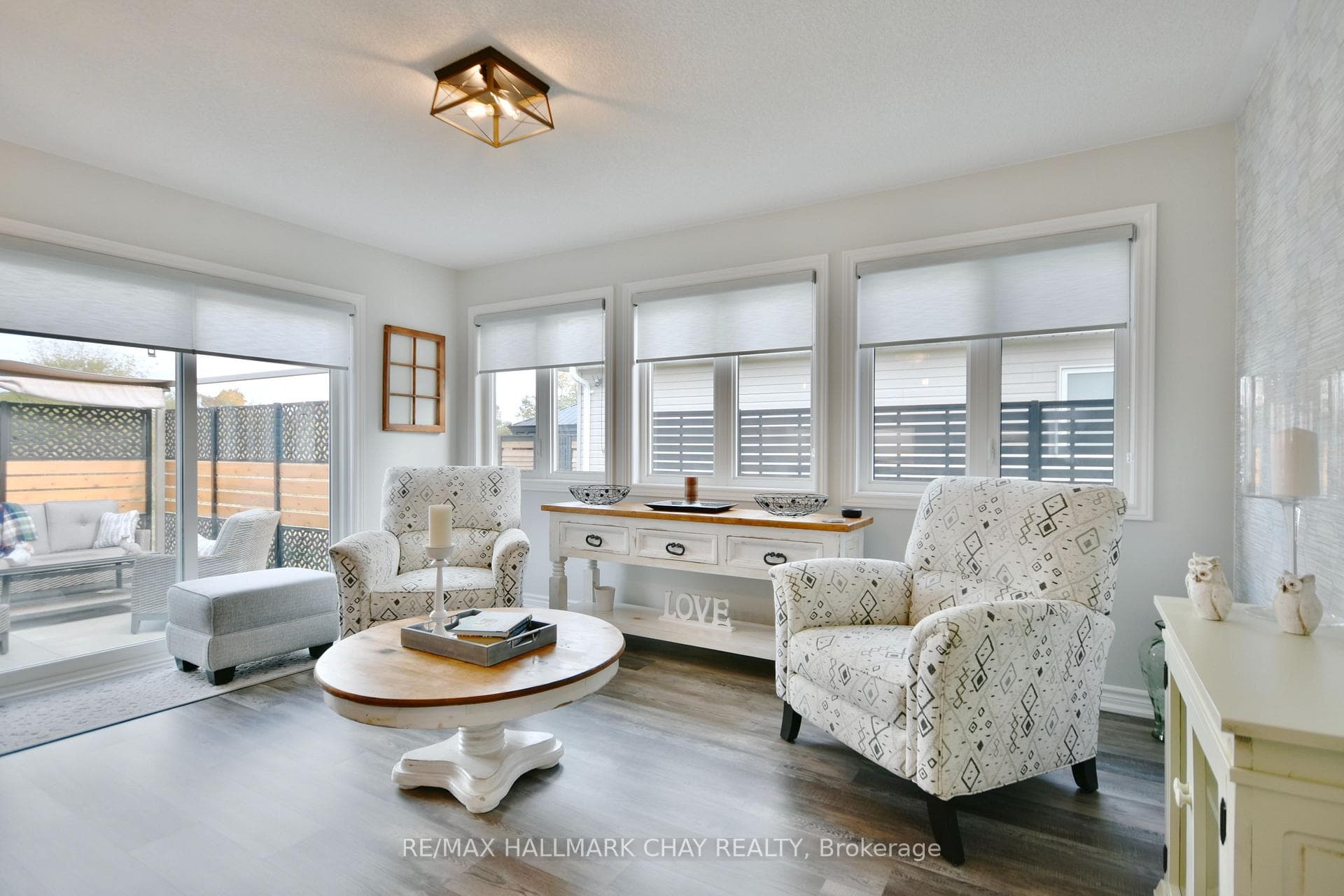 Sunroom with walkout to back patio