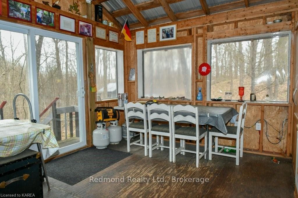 Sunroom has walkout to rear