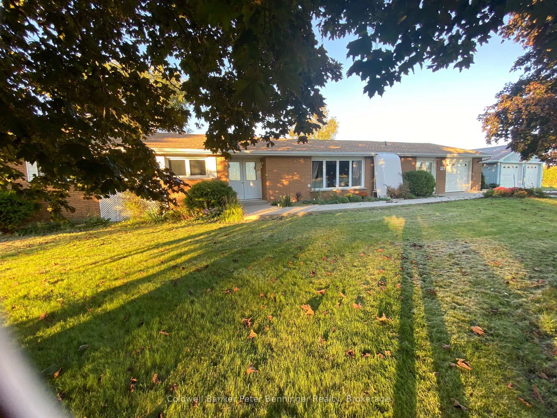 Home has single car garage and large detached shop