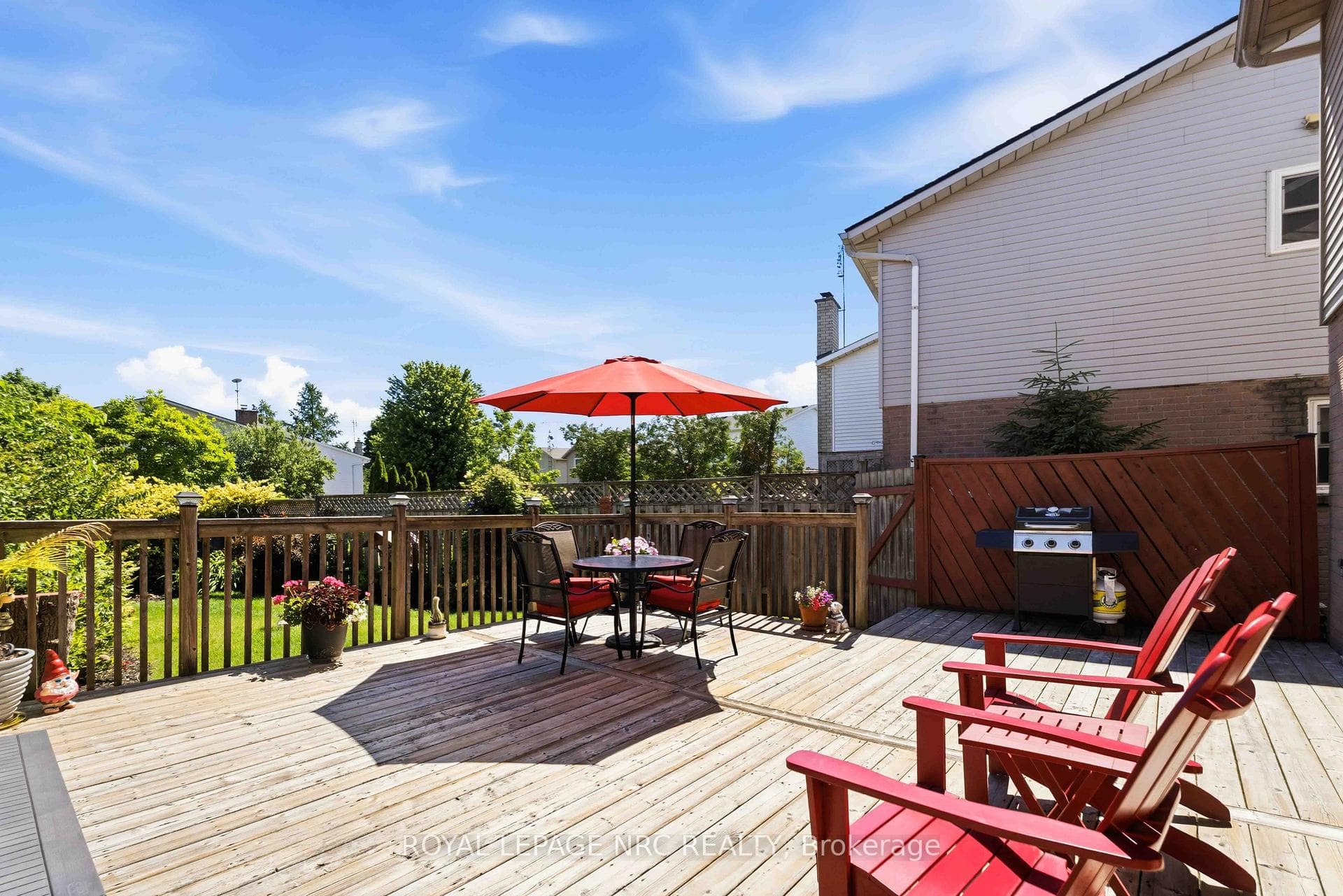 deck off the dining room to rear park like yard