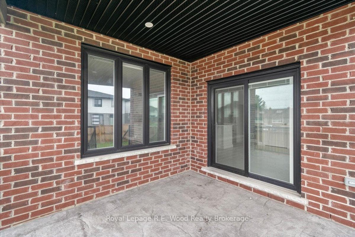 covered deck with patio doors to dining room