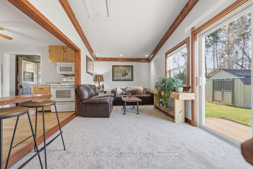 Main unit livingroom has access to backyard