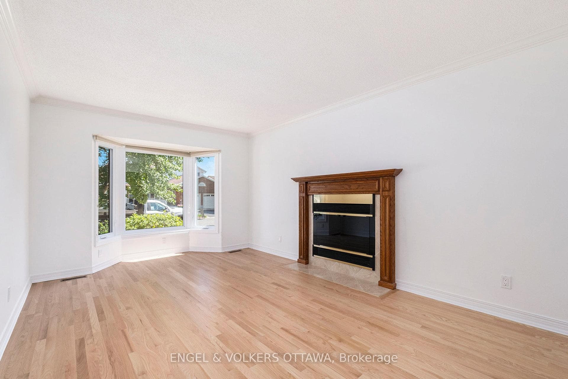 Gas fireplace and bay window with new hardwood