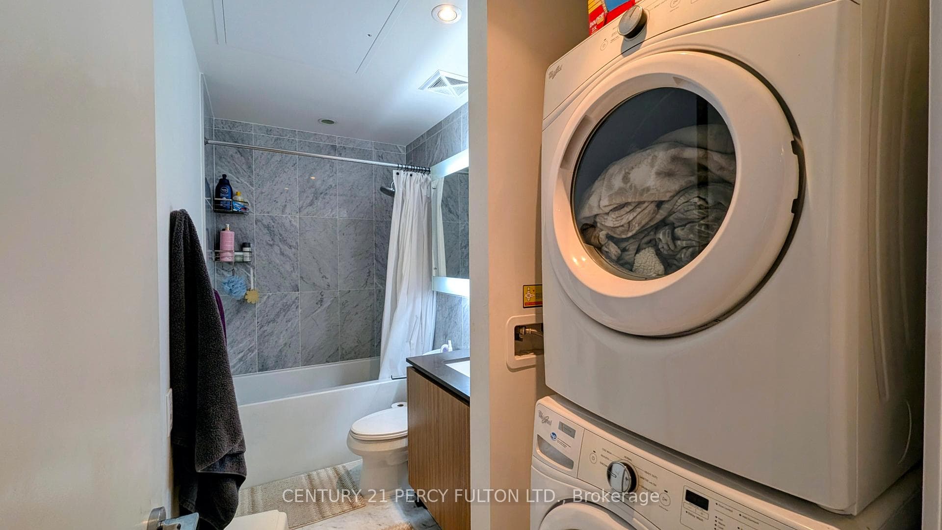 Full-sized laundry within bathroom