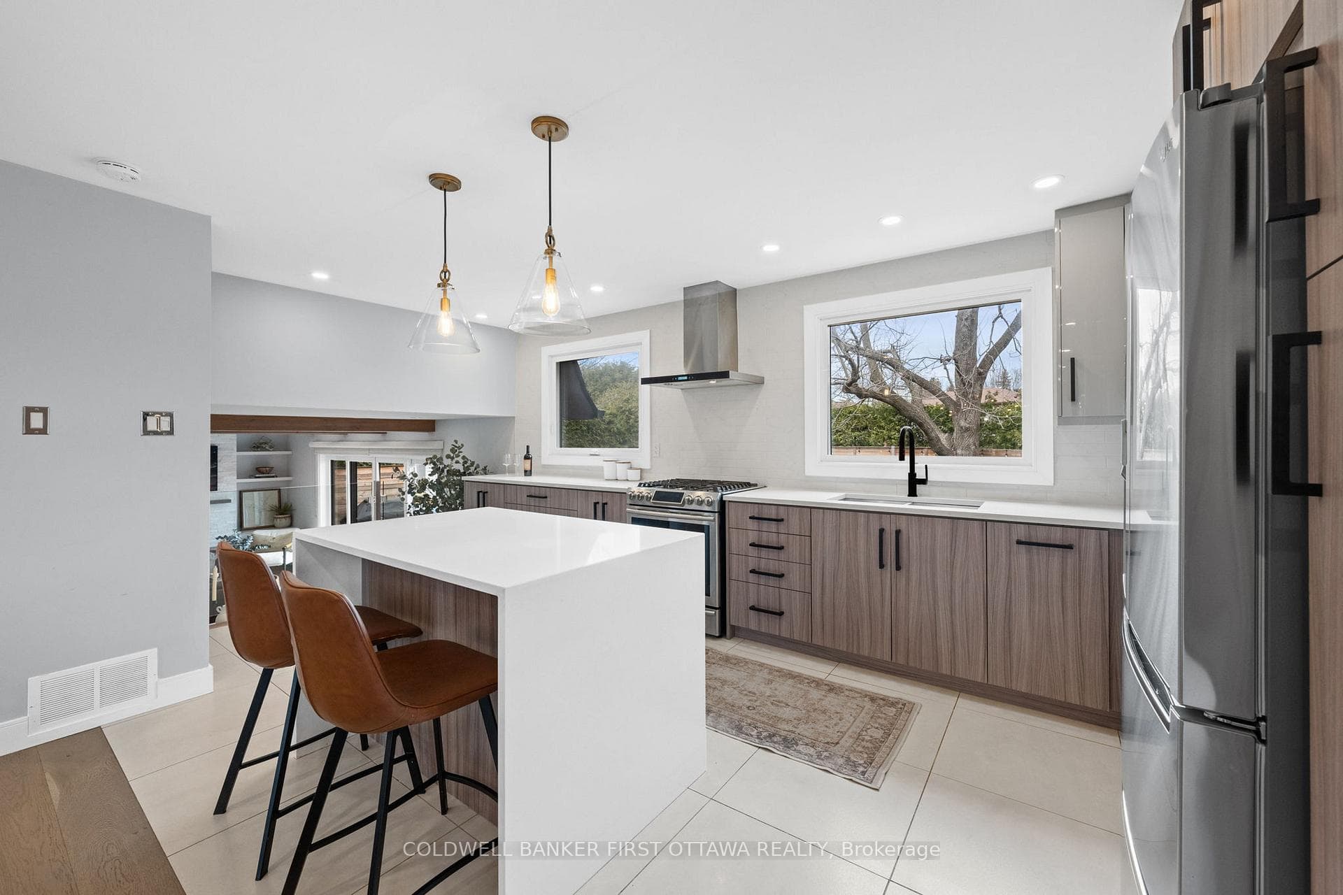 Oversized tile flooring & standup pantry storage.