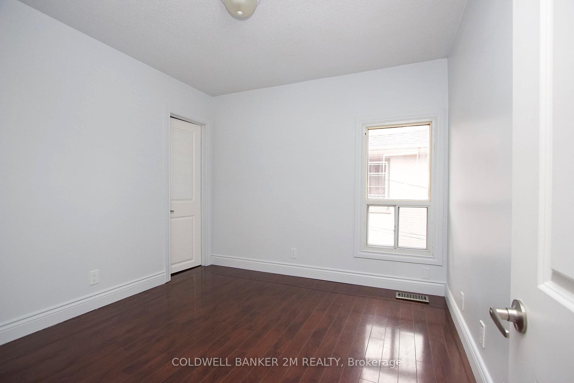 Bedroom with Closet & Window.