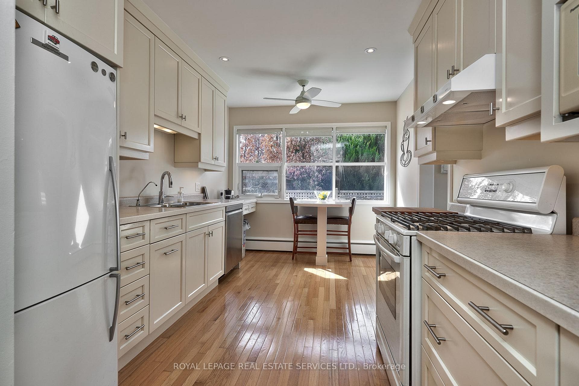 Gourmet Kitchen with Hardwood Flooring