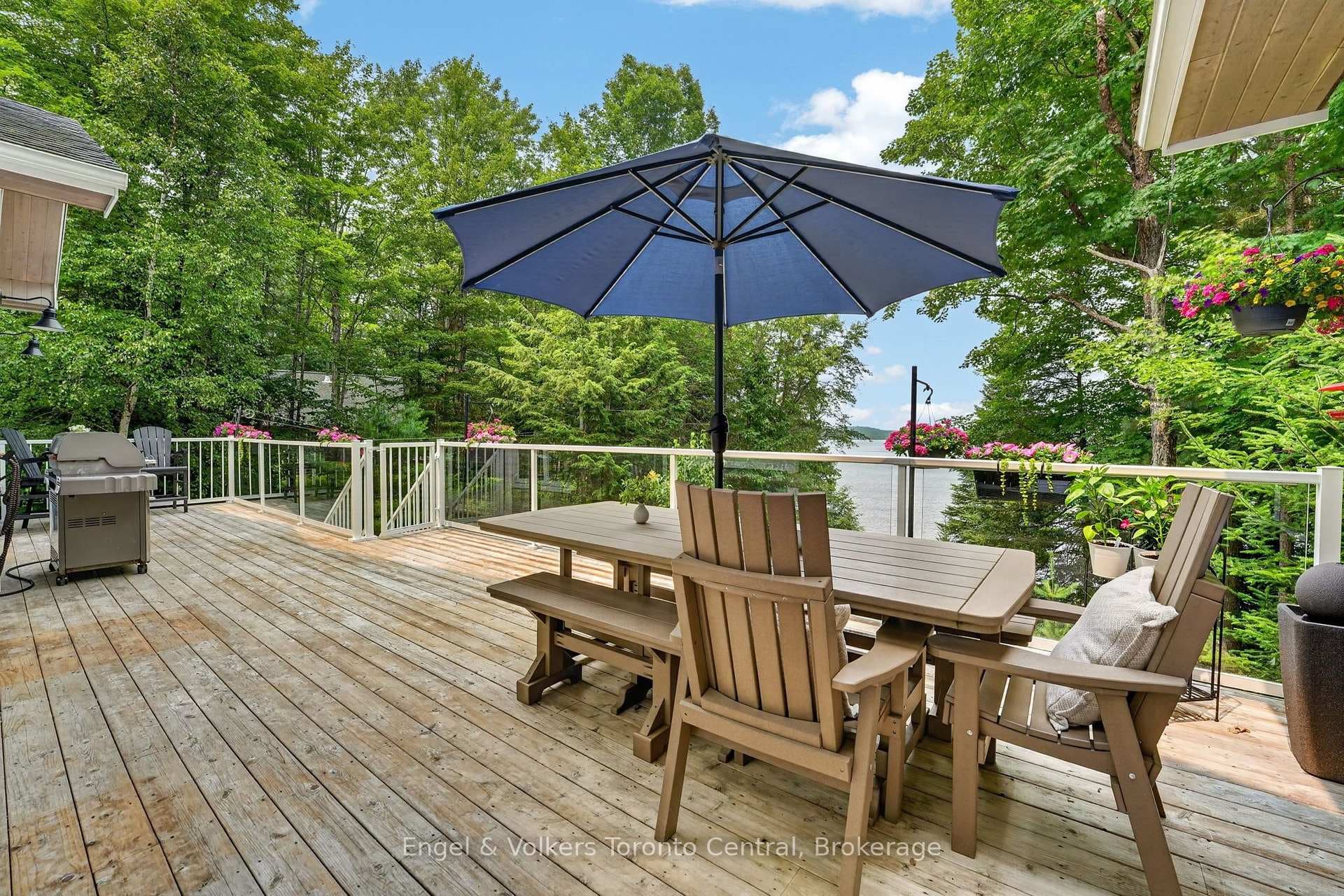 Huge deck with glass railings. Look at that view!
