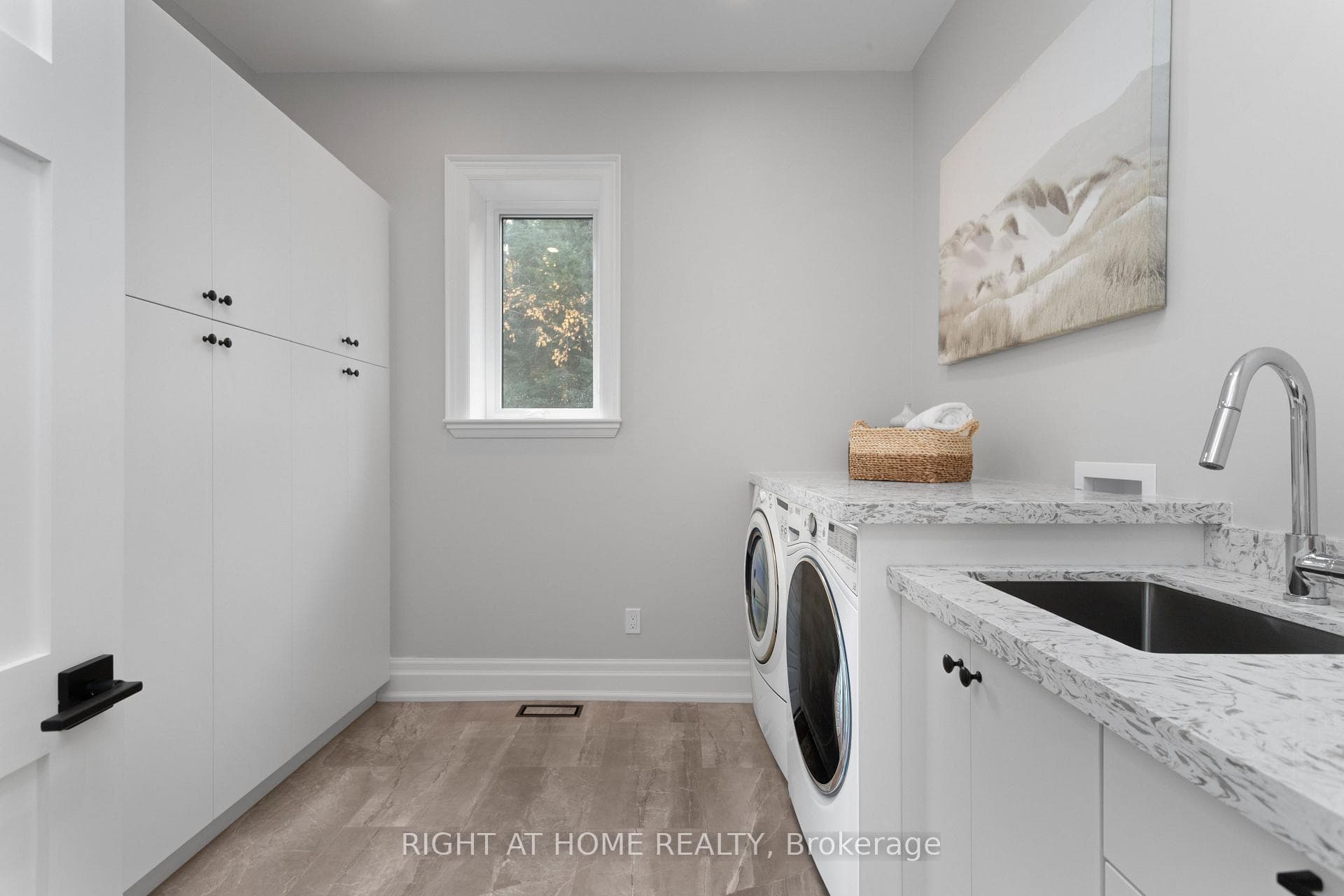 Incredible laundry room with built-ins