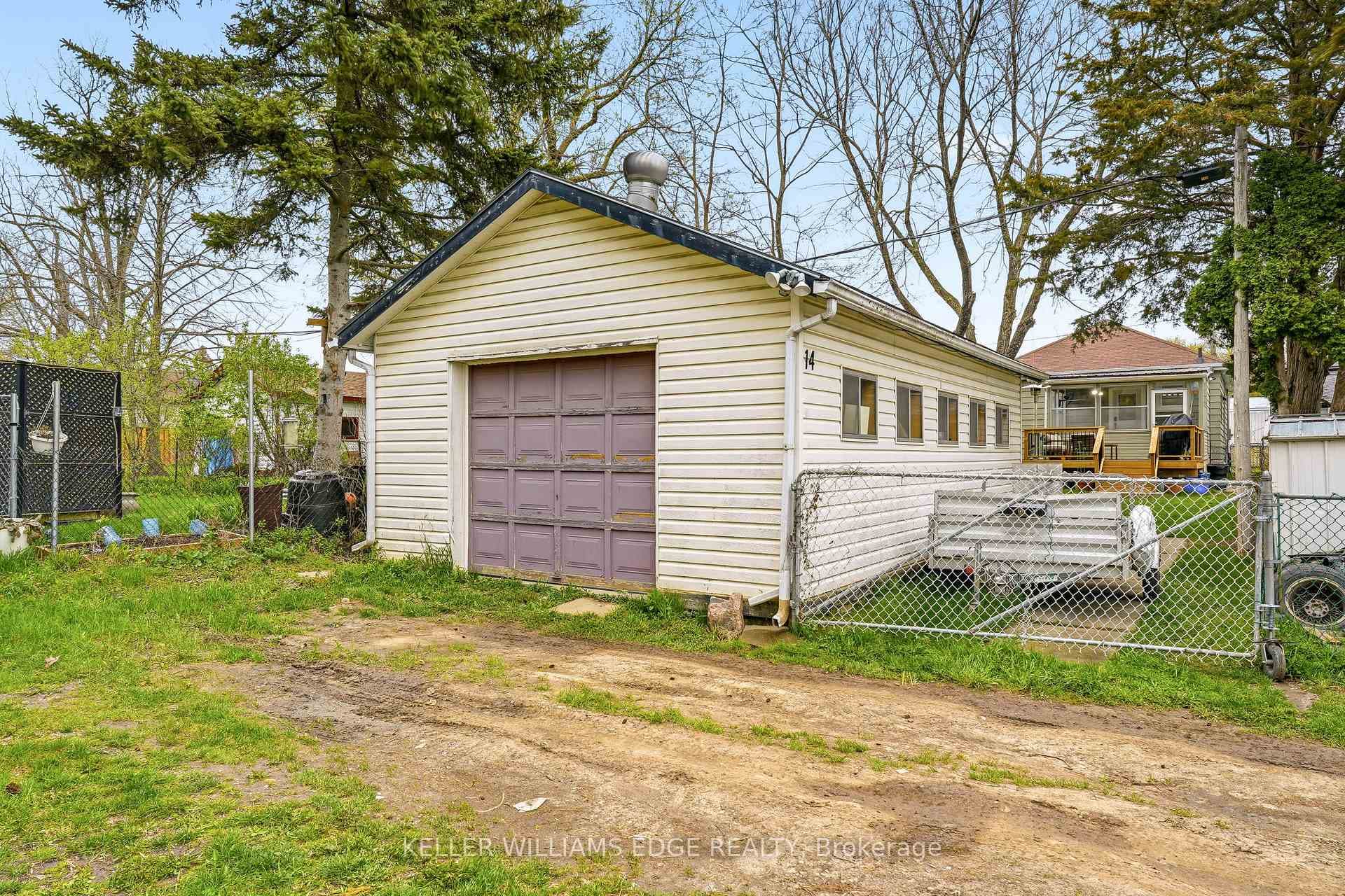 Detached Garage can hold 2 cars+ 4 on driveway